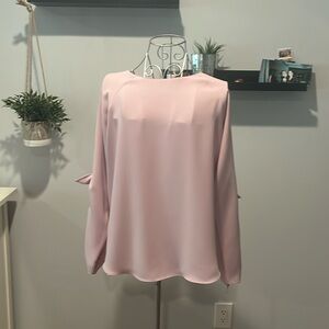 Light pink high neck blouse with open arm tie detail. M